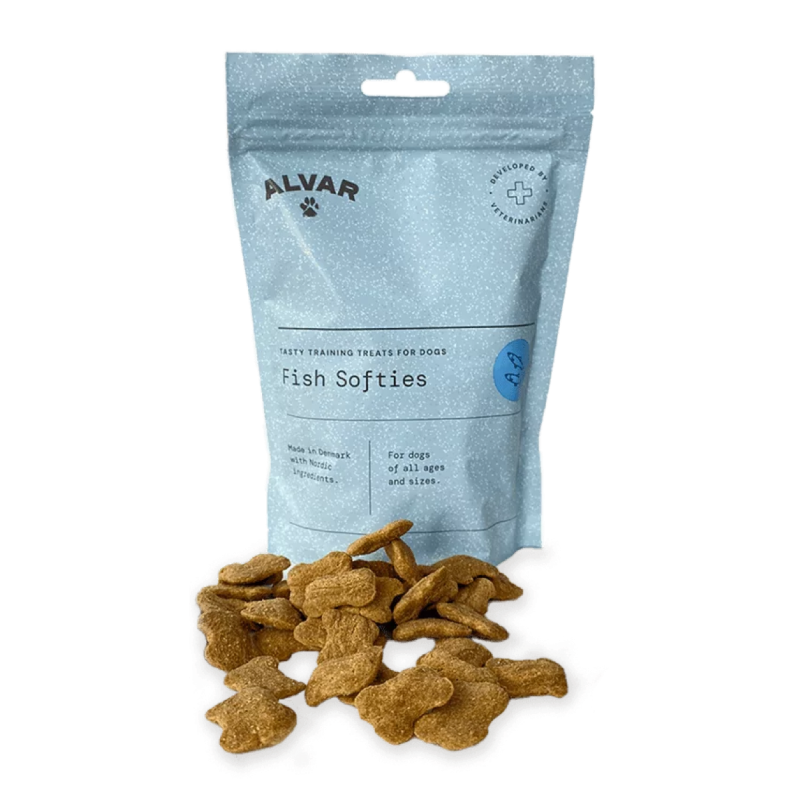 A package of Alvar Fish Softies dog treats with several treats visible in front of the package.