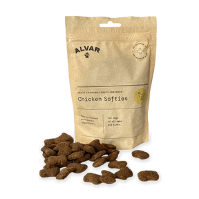 A package of Alvar Pet Chicken Softies with some treats visible in front of the package.