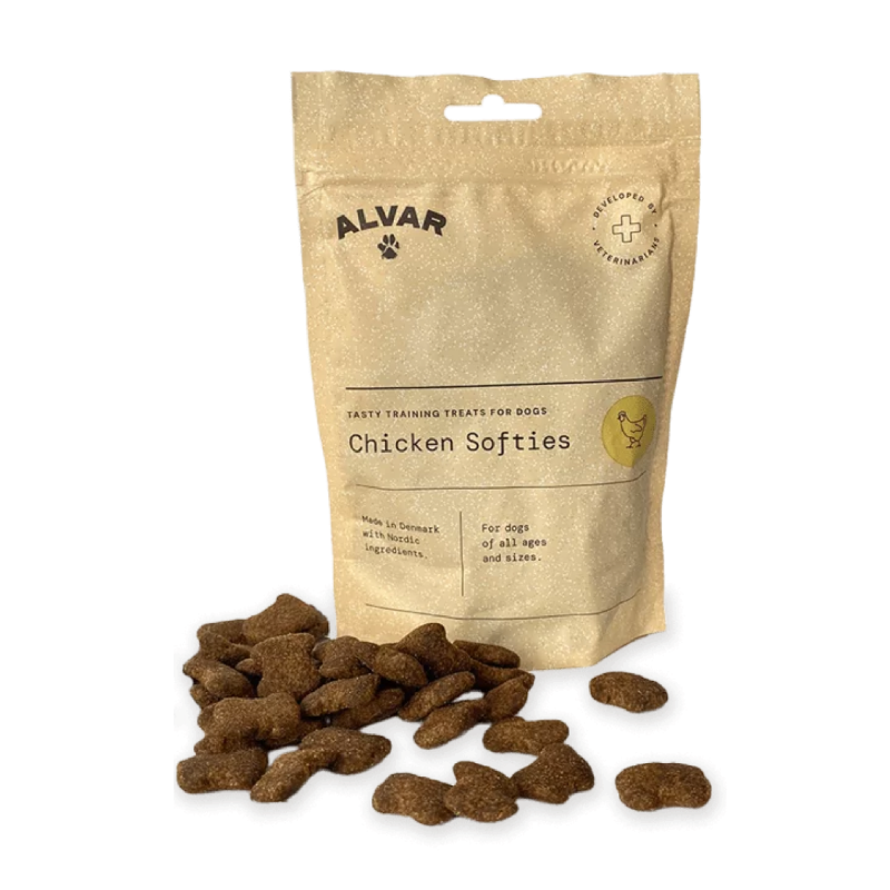 A package of Alvar Pet Chicken Softies with some treats visible in front of the package.